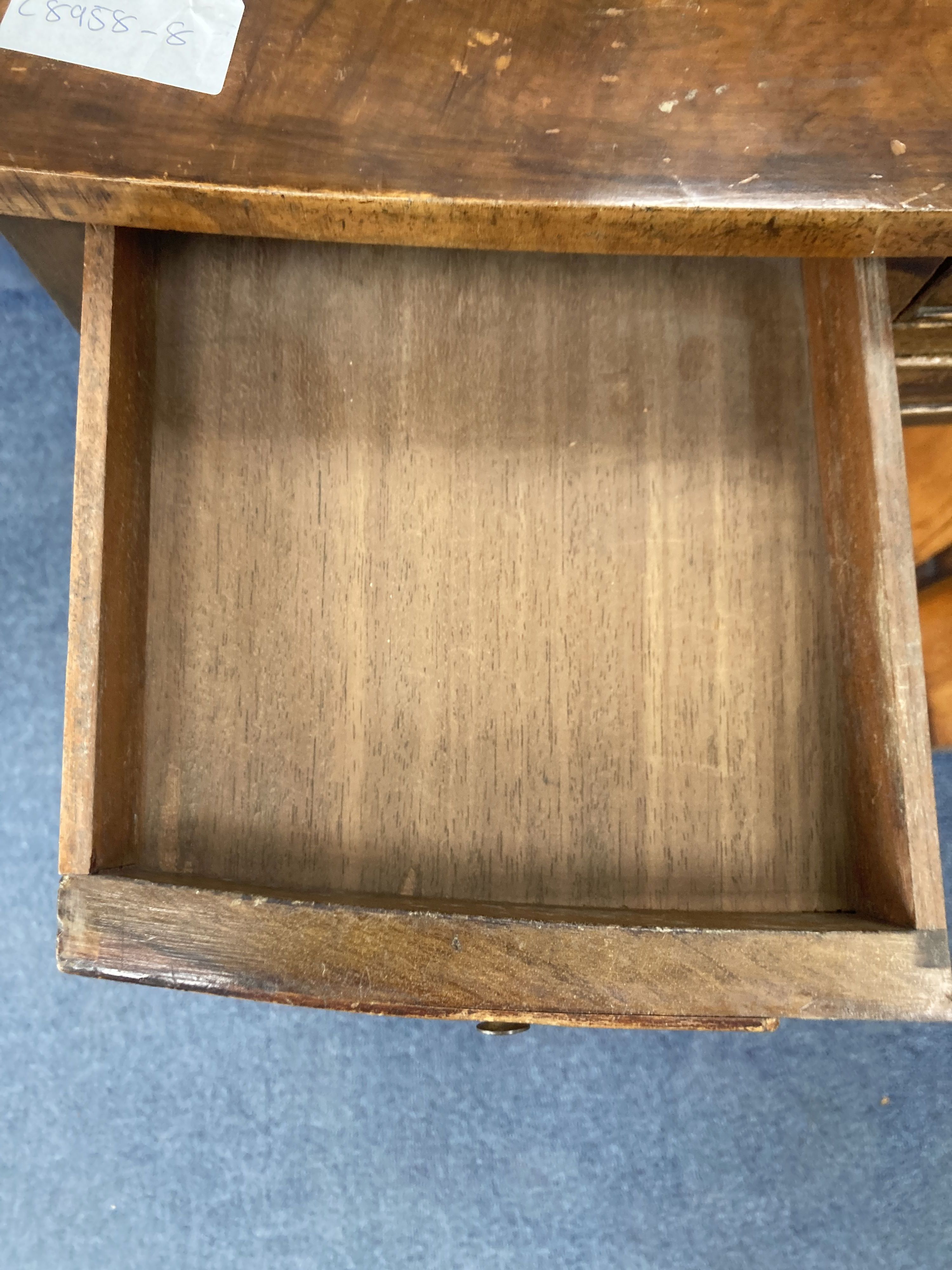 A George III style mahogany side table, fitted one long and two small drawers, width 48cm, depth 37cm, height 68cm